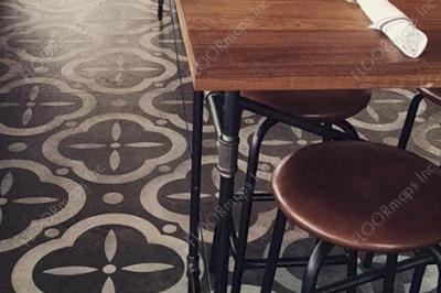 Close up of repeating pattern under a table and barstools.