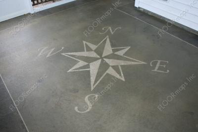 Compass rose design blasted into a low grit polished concrete floor.